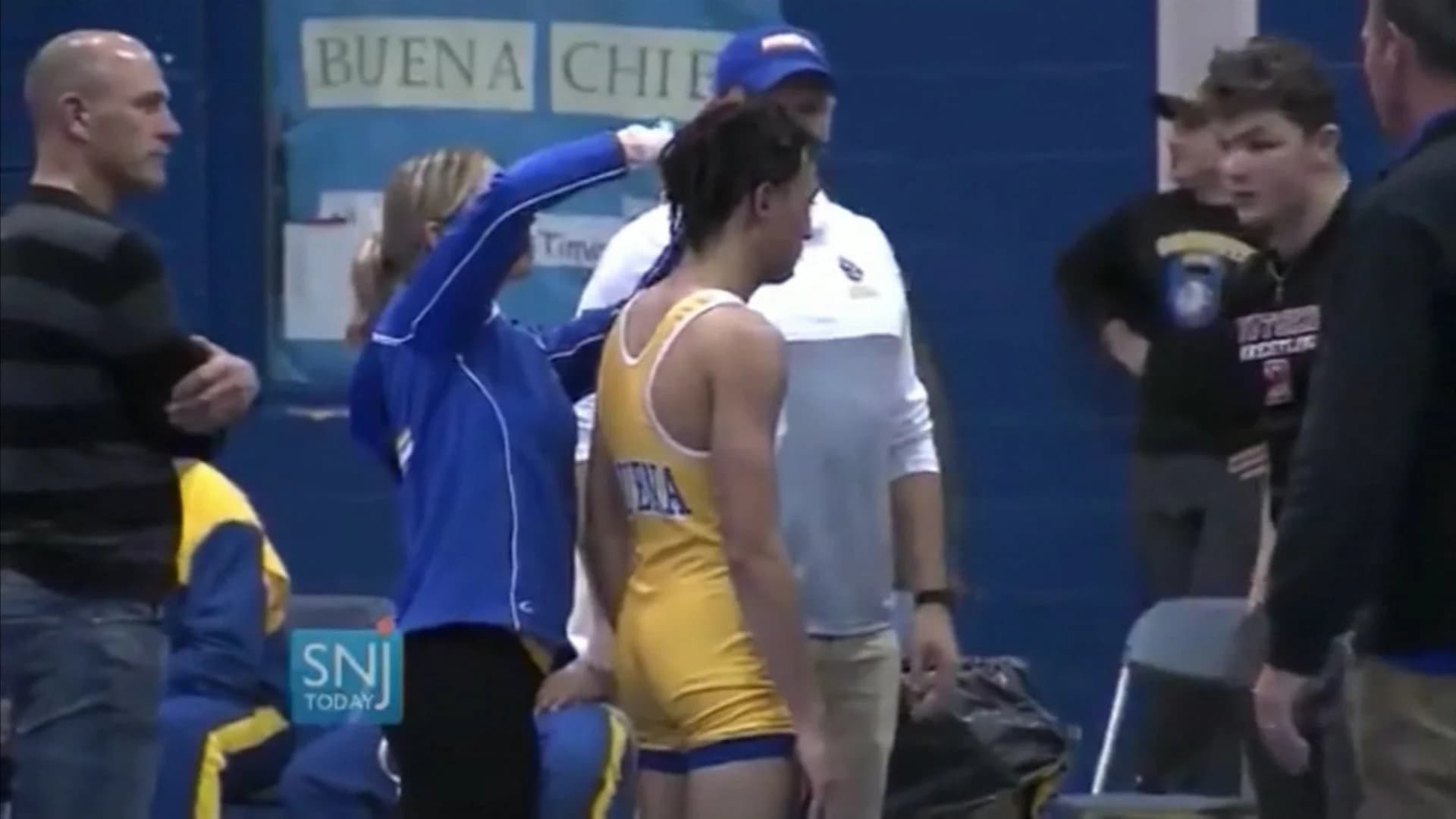 Referee in HS wrestling dreadlocks controversy files legal claim notice