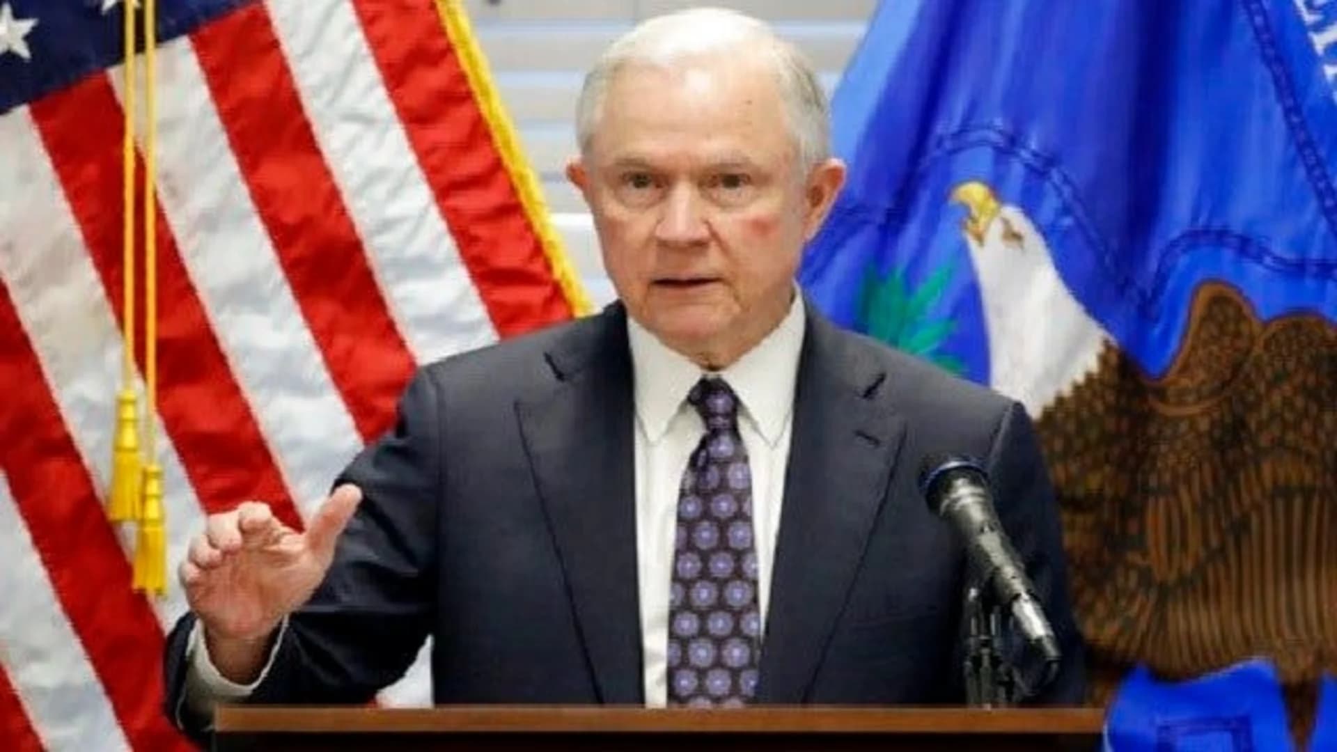 Publicly assailed by Trump, Sessions says he's staying on