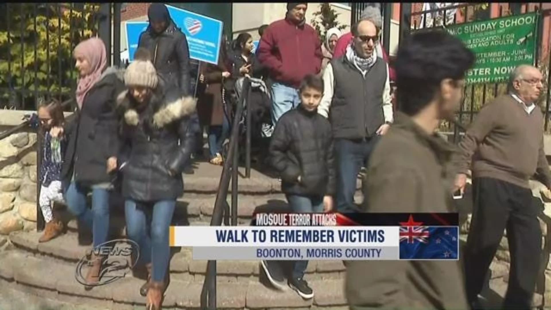 Community members honor New Zealand attack victims in walk, prayer