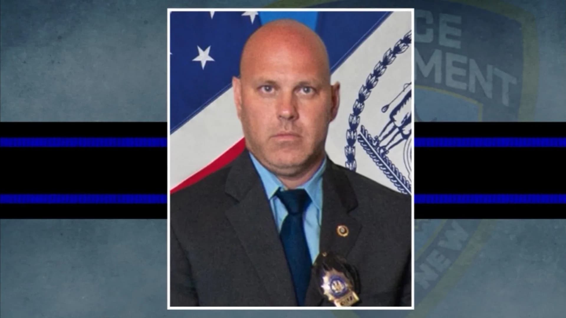 Fallen NYPD detective promoted during funeral Mass