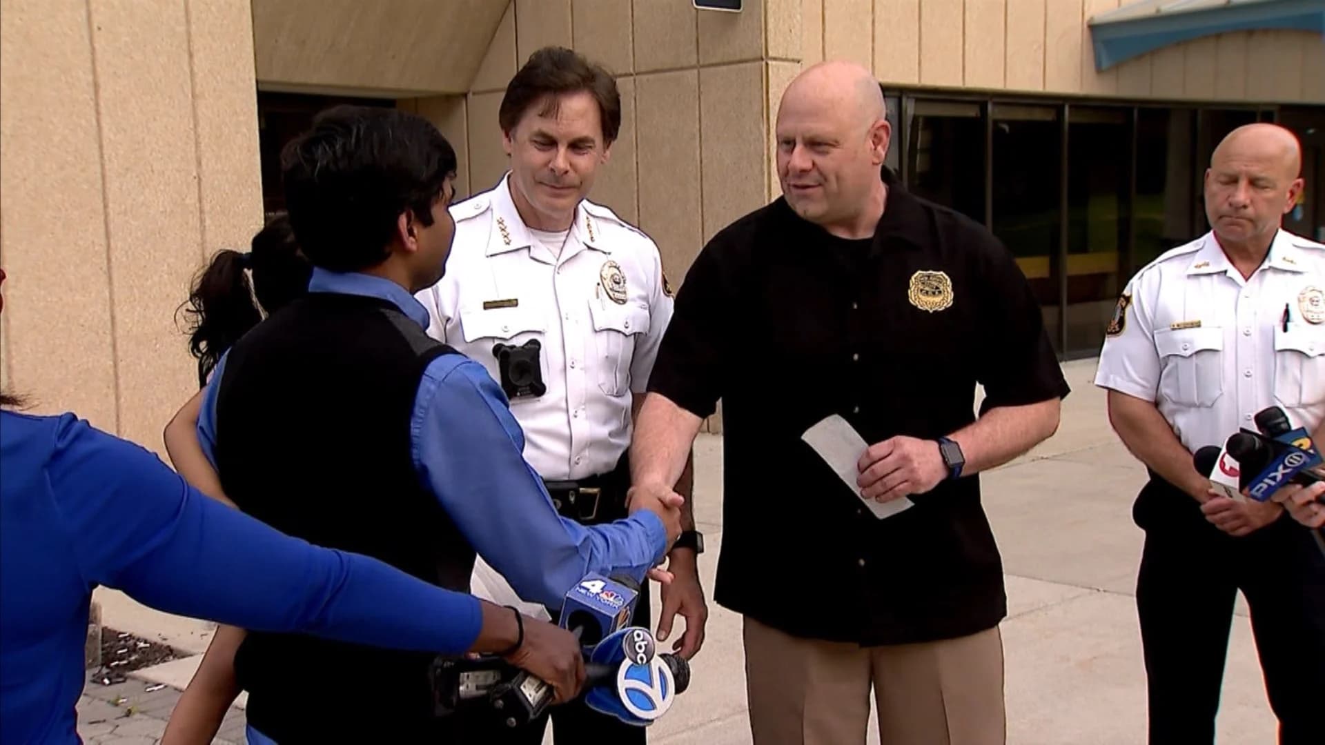 Edison police honor man who rescued woman who fell onto train tracks