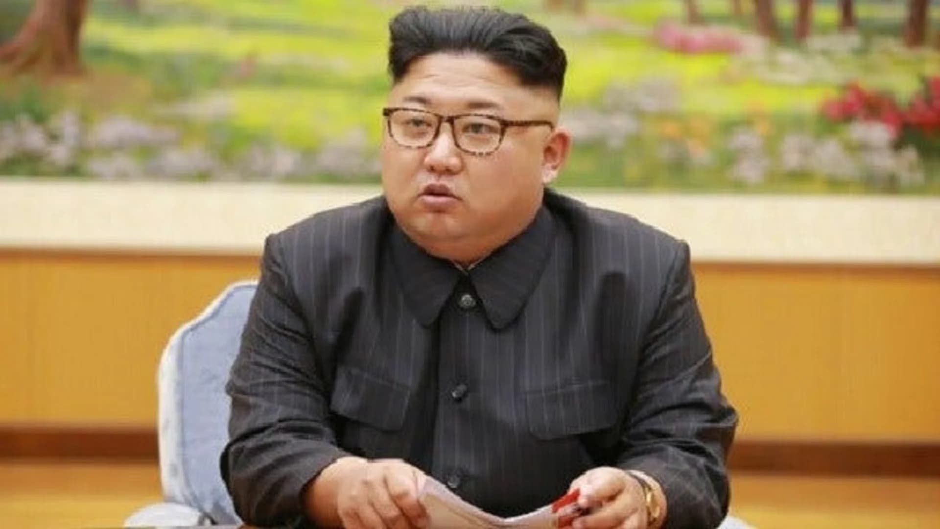 Kim Jong Un fires off insults at Trump, hints at weapons test
