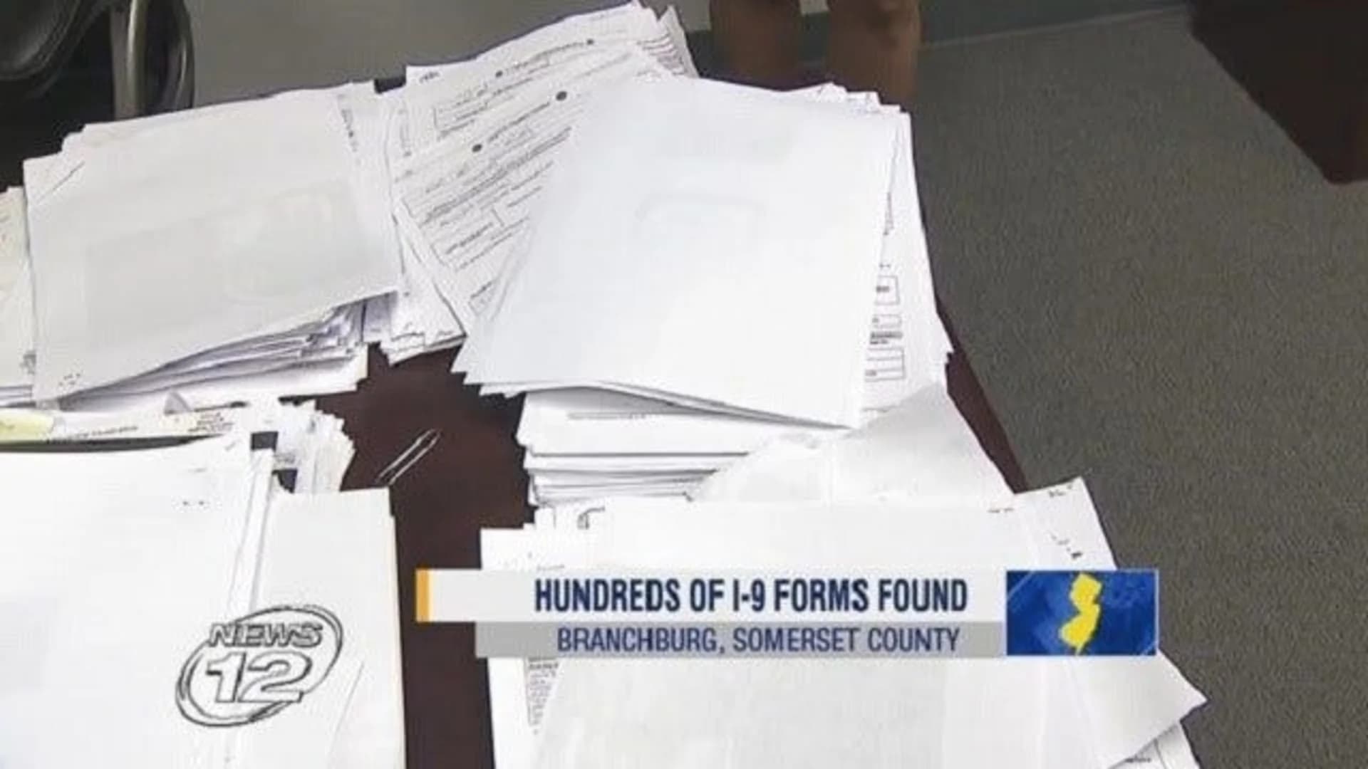 Federal officials retrieve I-9 forms found in used office furniture