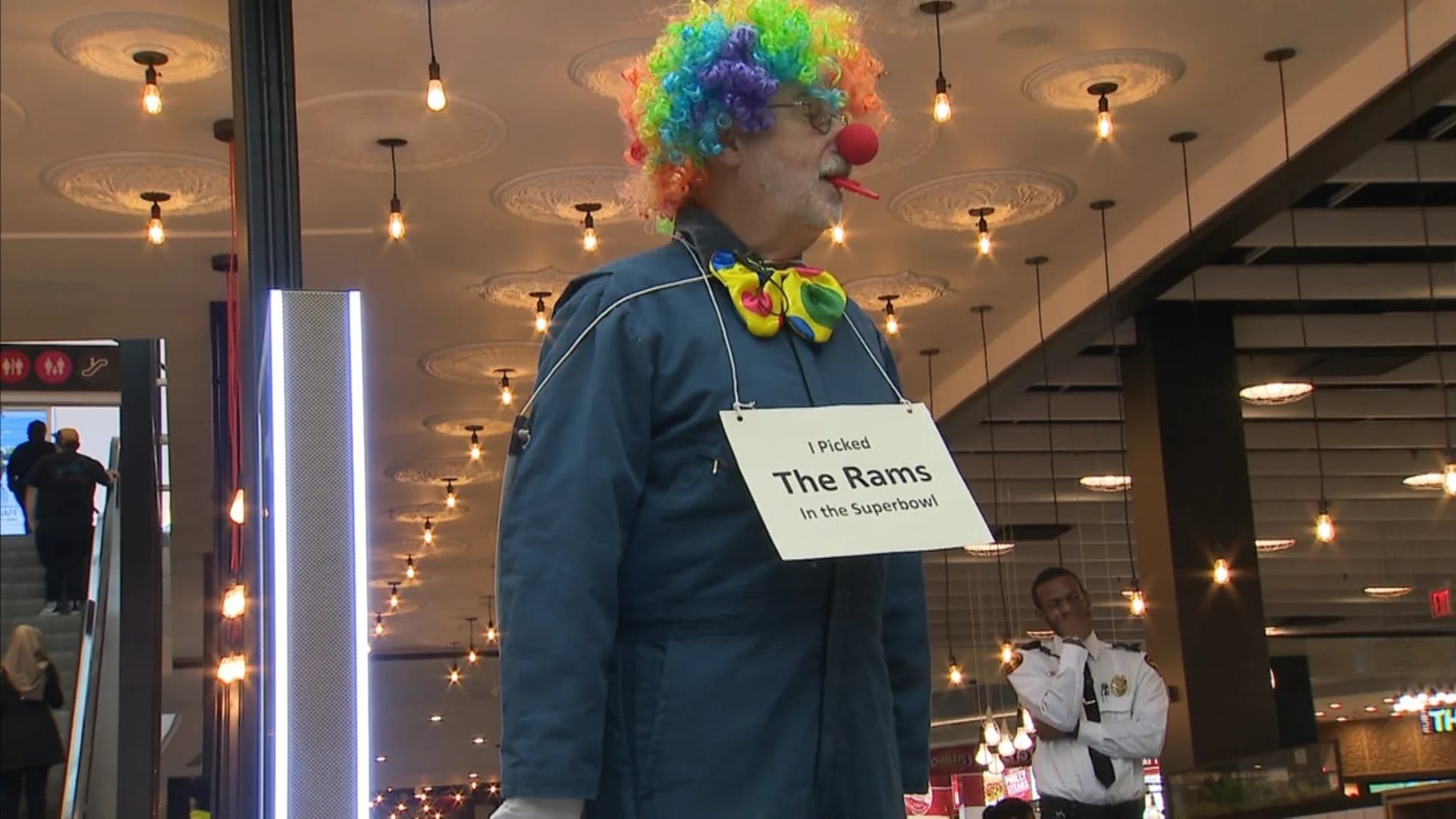Super Bowl bet-losing brother forced to dress as clown; play the kazoo