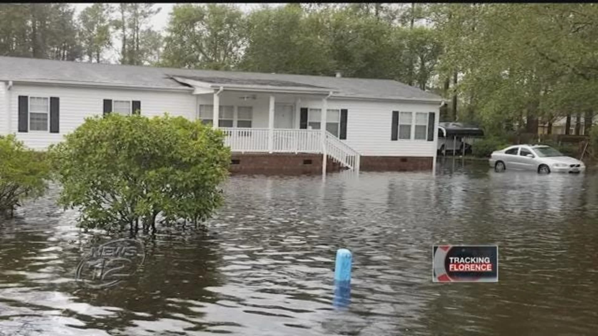 North Carolina governor pleads with storm evacuees to be patient