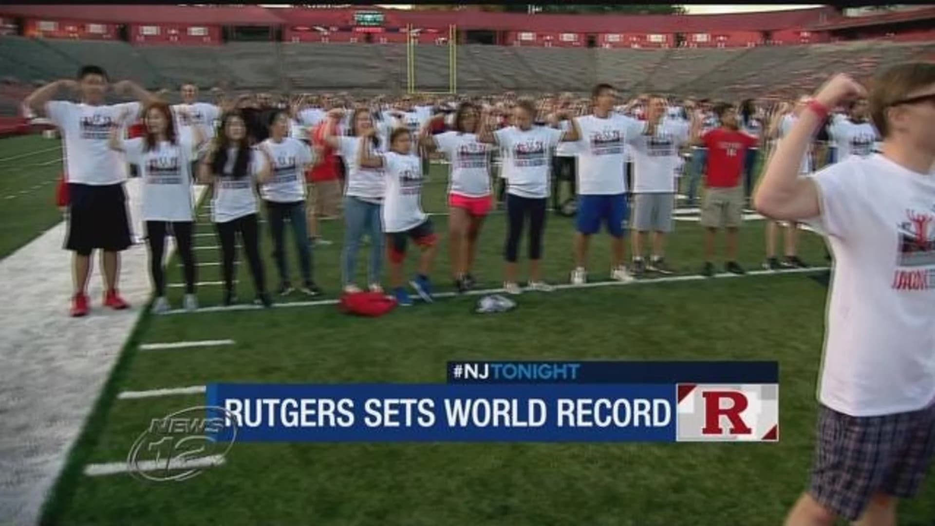Hundreds strike a pose to help Rutgers break Guinness World Record