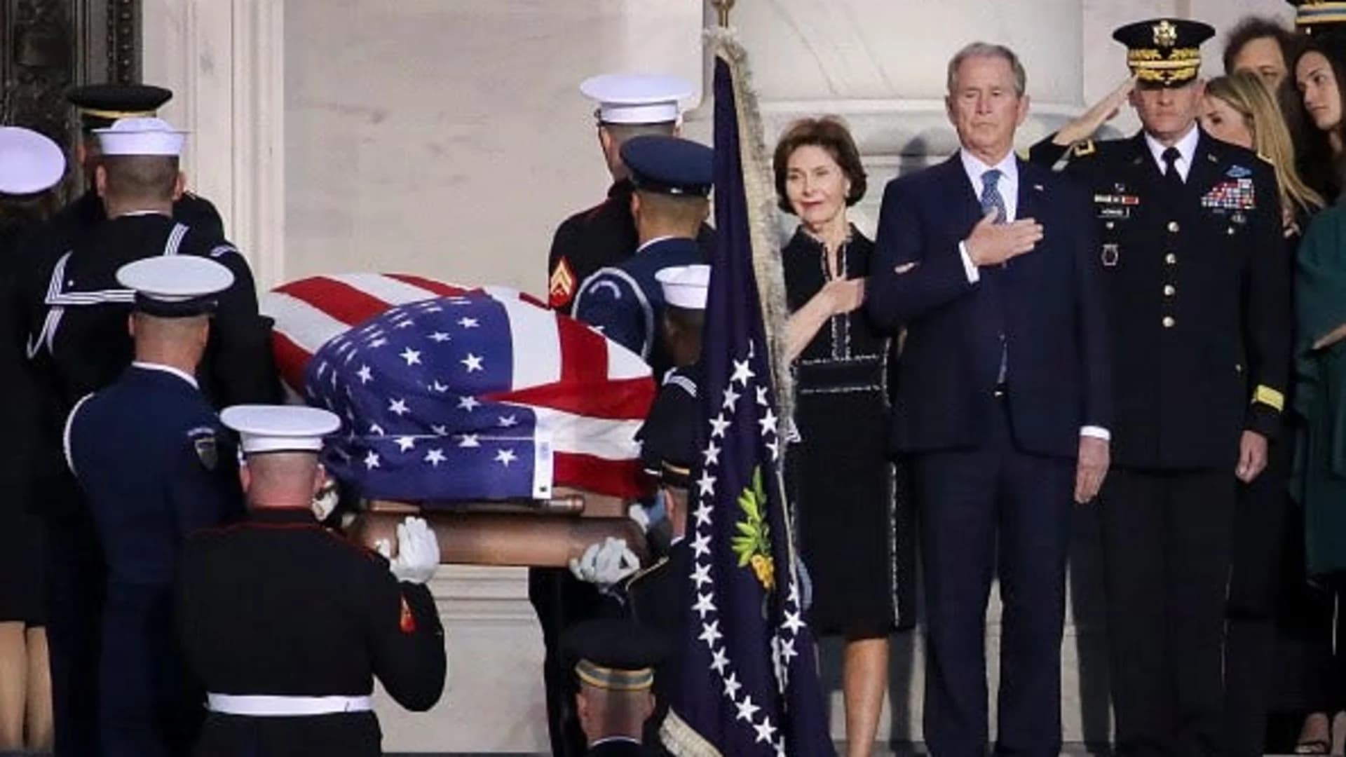 Bush saluted with praise, humor, cannons at capital farewell