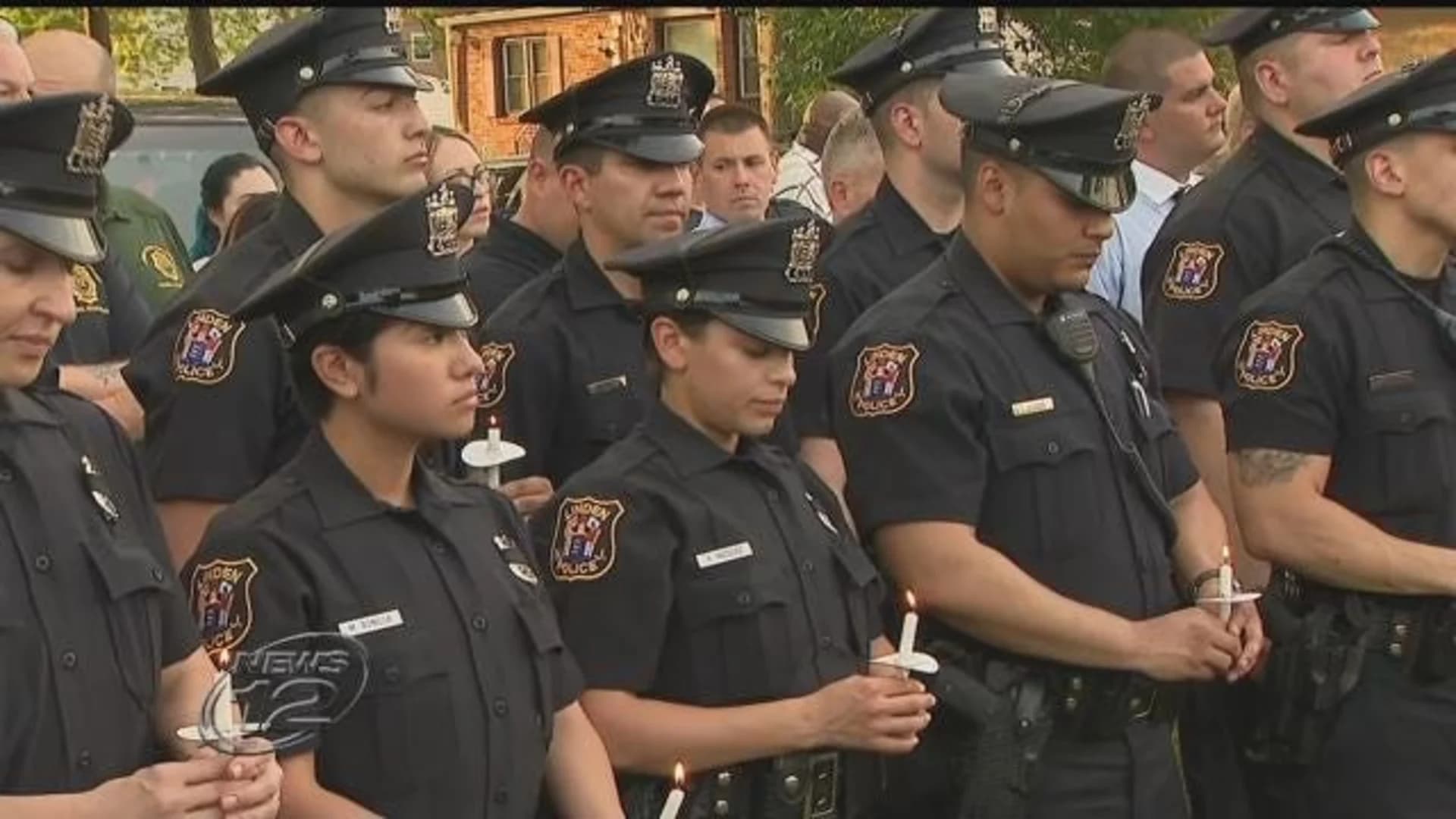 Candlelight vigil held for officer killed by train
