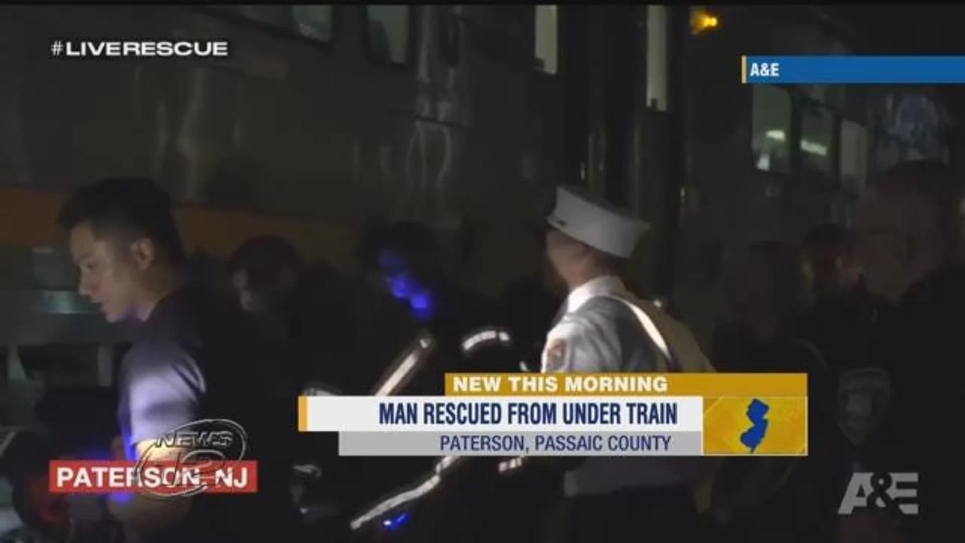Paterson police rescue man from under train