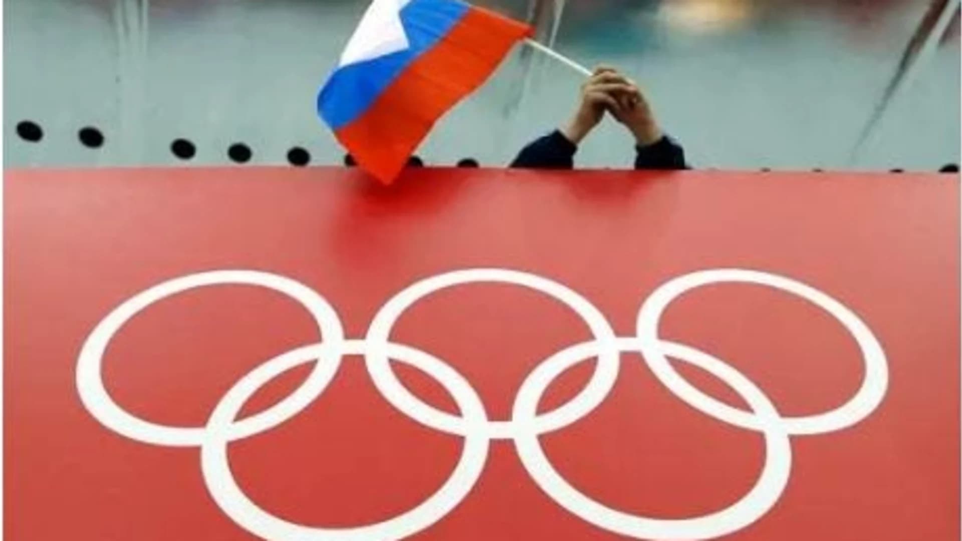 IOC: Russians can compete at Olympics, but without flag