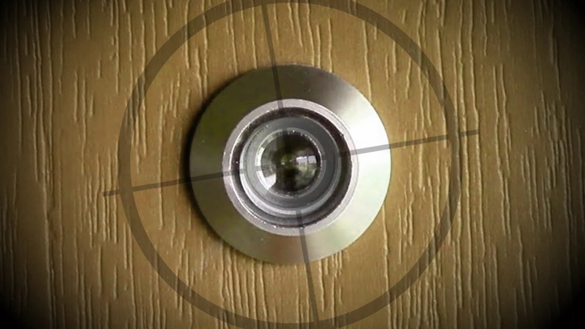 Police: Man looking through peephole of apartment door shot in eye