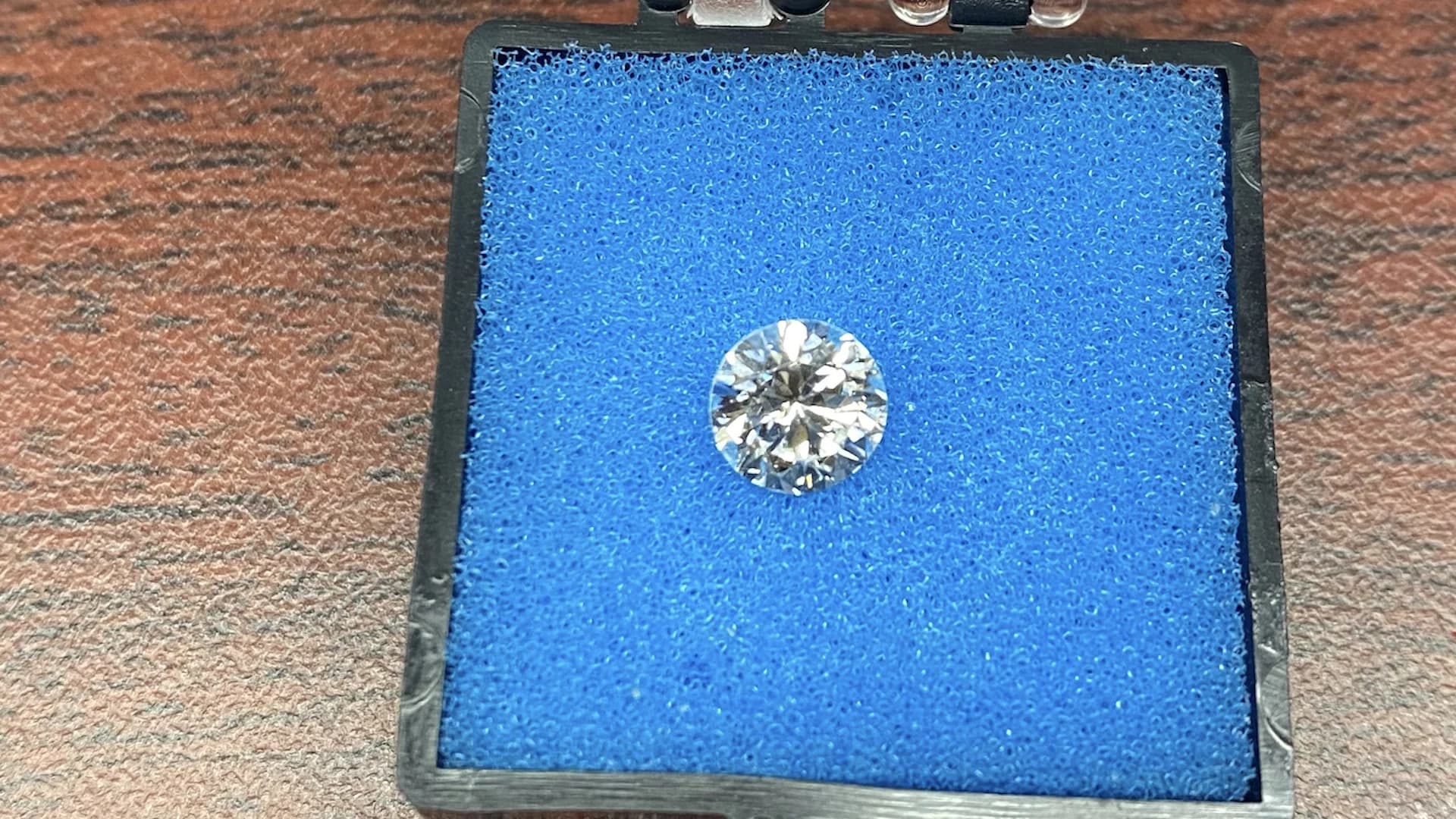 TSA officer spots 'sparkle' on ground, finds missing diamond from engagement ring at JFK