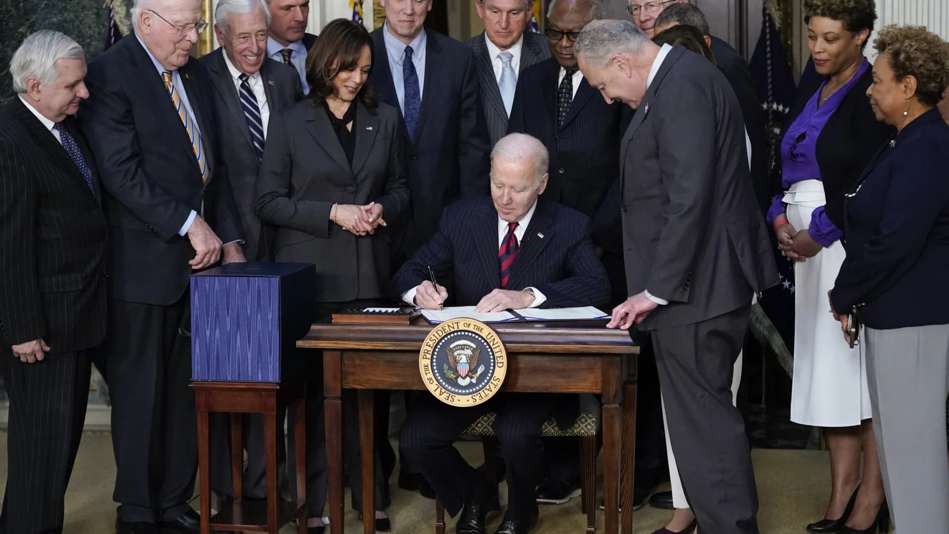 President Biden signs budget bill with Ukraine aid but no virus cash