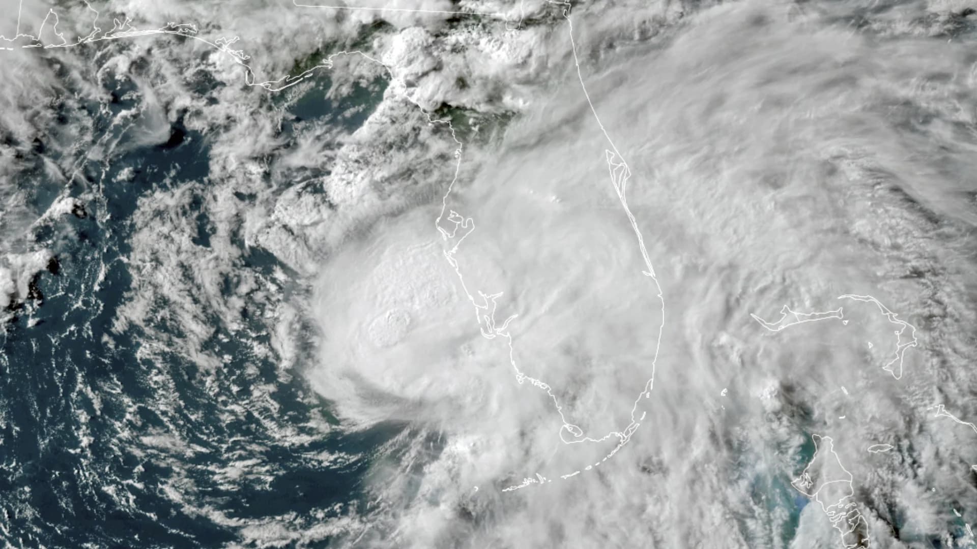 Officials: Storm lashing Florida strengthens into hurricane