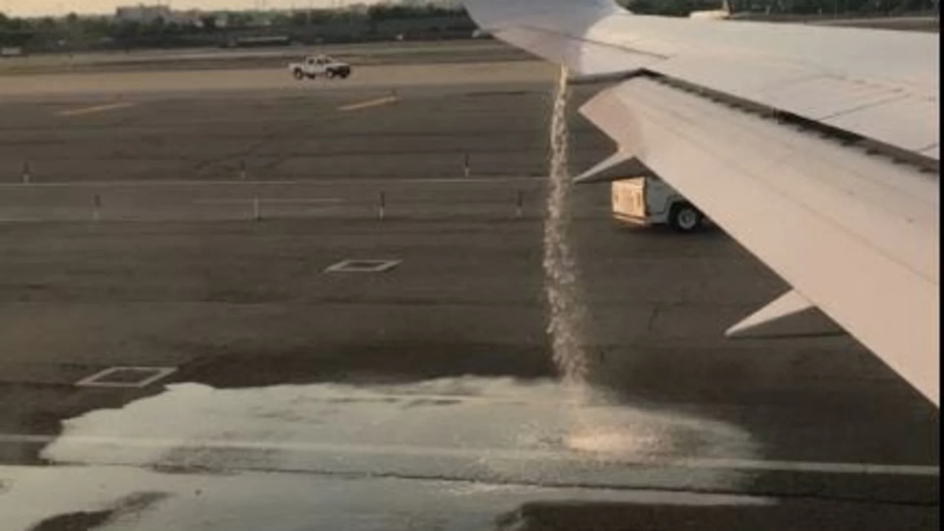 Flight to Italy canceled after fuel leaks from wing on runway
