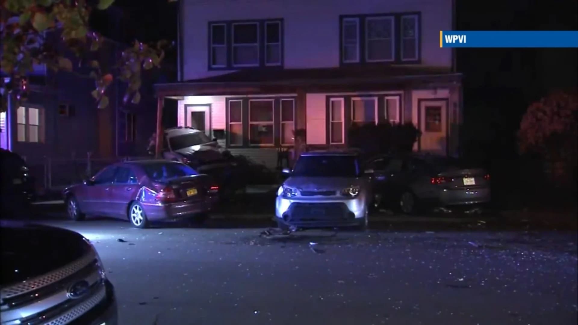 Multi-vehicle crash sends SUV into porch in Hamilton Township
